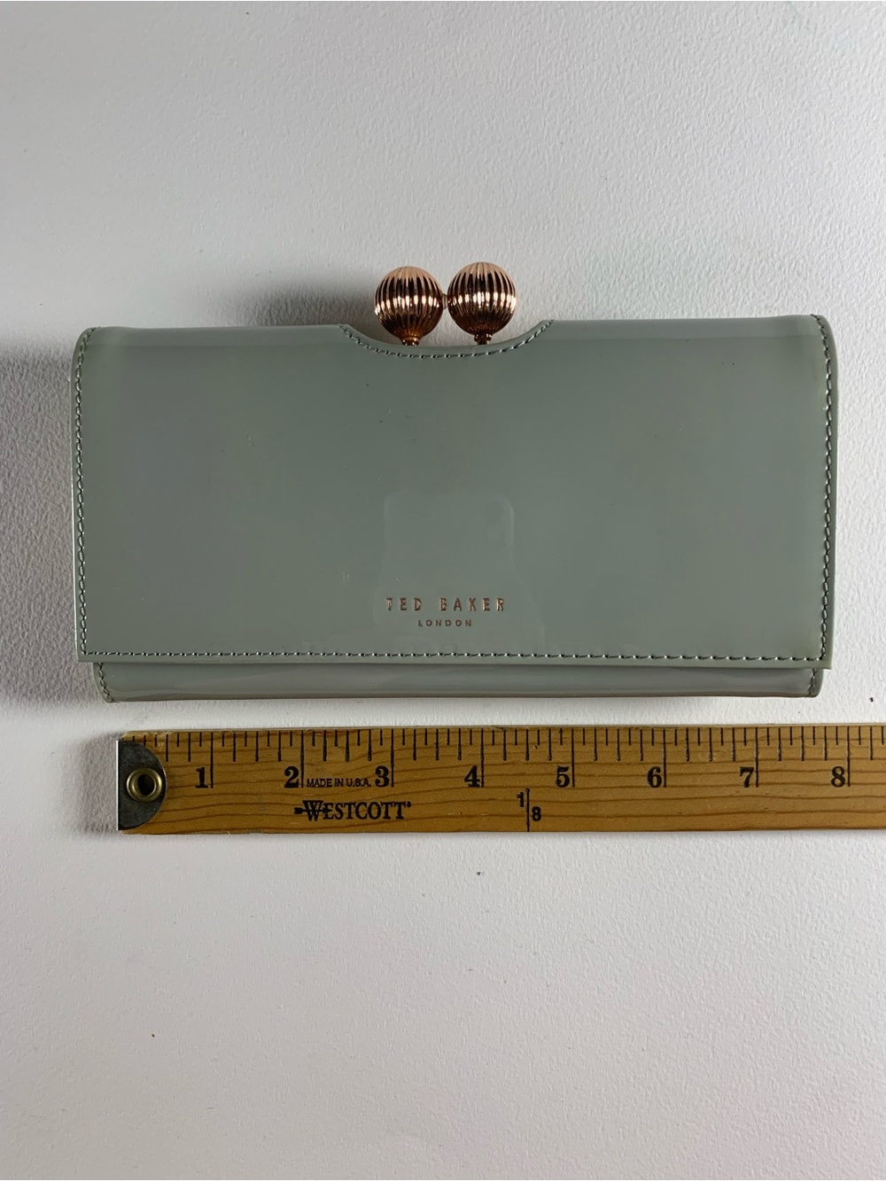 Ted Baker “Bobble” Matinee Wallet — Sage Green Patent, Rose Gold Hardware